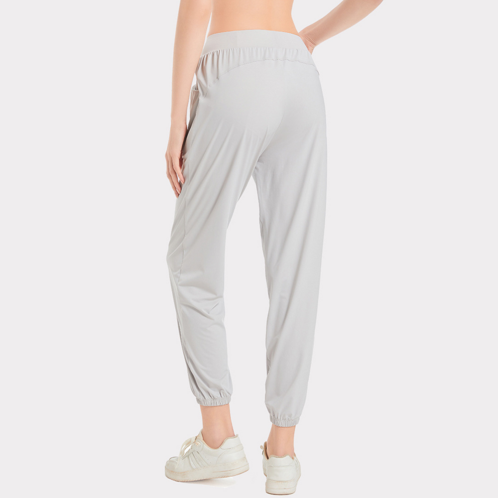 
                  
                    High-Waisted Quick-Dry Yoga Pants - Breathable Loose Fit Fitness Trousers
                  
                